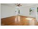 Sun-filled bedroom with hardwood floors, multiple windows, and a ceiling fan at 16018 N 17Th Way, Phoenix, AZ 85022