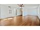 Expansive bedroom featuring hardwood floors, a ceiling fan, and access to a bathroom at 16018 N 17Th Way, Phoenix, AZ 85022