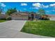 Charming single-Gathering home with well-maintained landscaping, spacious driveway and three car garage at 16018 N 17Th Way, Phoenix, AZ 85022