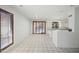 Open floor plan with tile flooring leads to a bright, modern kitchen at 16018 N 17Th Way, Phoenix, AZ 85022