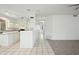 Bright, airy living space showcasing neutral tones and connecting to the updated kitchen at 16018 N 17Th Way, Phoenix, AZ 85022