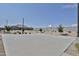 Outdoor basketball court with a well-maintained surface and a basketball hoop with nice landscaping at 16873 W Fetlock Trl, Surprise, AZ 85387