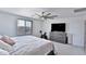 Bedroom with a ceiling fan and TV at 16873 W Fetlock Trl, Surprise, AZ 85387