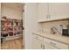 Spacious pantry with custom shelving for organized storage at 16873 W Fetlock Trl, Surprise, AZ 85387