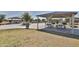 Community park with covered picnic tables, providing a nice outdoor gathering space at 16873 W Fetlock Trl, Surprise, AZ 85387
