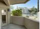 Private patio overlooking the community pool and well-maintained landscaping at 1747 E Northern E Ave # 166, Phoenix, AZ 85020