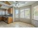 The kitchen eating area is spacious with an abundance of natural light from the windows at 18194 N 59Th Ln, Glendale, AZ 85308
