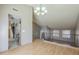 Open-concept home with a laminate flooring, stairs, stainless steel appliances, and lots of natural light at 18194 N 59Th Ln, Glendale, AZ 85308