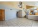 Open-concept layout seamlessly connects the living area with stairs, tile flooring, and bright open spaces at 18194 N 59Th Ln, Glendale, AZ 85308