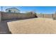 This large backyard is surrounded by a block wall and is ready for landscaping at 19685 W Roma Ave, Litchfield Park, AZ 85340