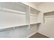 Bright and airy closet featuring multiple racks and shelves for optimal organization at 19685 W Roma Ave, Litchfield Park, AZ 85340