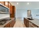 Modern kitchen featuring stainless steel appliances, granite counters, and a functional island at 19685 W Roma Ave, Litchfield Park, AZ 85340