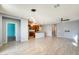 Open concept living space with access to the kitchen, dining area, and additional rooms at 19685 W Roma Ave, Litchfield Park, AZ 85340
