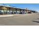 A modern storefront with a variety of businesses and ample parking spaces available at 19685 W Roma Ave, Litchfield Park, AZ 85340