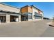 Exterior facade of the grocery store with modern architecture and ample parking at 19685 W Roma Ave, Litchfield Park, AZ 85340