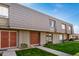 Delightful townhome with a well-kept lawn and attractive exterior, creating a warm and inviting curb appeal at 2048 W Elm St, Phoenix, AZ 85015