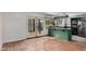 Inviting kitchen features a center island, modern appliances, and seamless access to the patio for indoor-outdoor living at 2048 W Elm St, Phoenix, AZ 85015