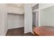Spacious walk-in closet featuring wood flooring and storage solutions at 2048 W Elm St, Phoenix, AZ 85015