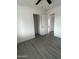 The bedroom features neutral walls, modern flooring, and two large closets at 2224 W Fairmount Ave, Phoenix, AZ 85015