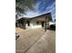 A well-maintained house featuring a spacious carport and an inviting, neutral color scheme at 2224 W Fairmount Ave, Phoenix, AZ 85015