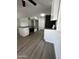 Open concept kitchen boasts island, sleek appliances, and recessed lighting at 2224 W Fairmount Ave, Phoenix, AZ 85015