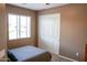 Cozy bedroom with a window and closet at 250 W Queen Creek Rd # 229, Chandler, AZ 85248