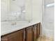Well-lit bathroom with double sinks, ample vanity space, and shower-tub combo at 25824 N 54Th Ave, Phoenix, AZ 85083