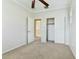 Spacious bedroom featuring plush carpet and closet space, perfect for comfortable living at 25824 N 54Th Ave, Phoenix, AZ 85083