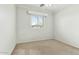 Relaxing bedroom with carpet and a window letting in natural light for a serene ambiance at 25824 N 54Th Ave, Phoenix, AZ 85083