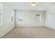 Bedroom with three windows with blinds and carpet at 25824 N 54Th Ave, Phoenix, AZ 85083