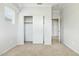 Cozy bedroom featuring plush carpet, closet space, and a window providing natural light at 25824 N 54Th Ave, Phoenix, AZ 85083