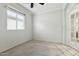 Bright bedroom with neutral carpet, a window with blinds and a ceiling fan at 25824 N 54Th Ave, Phoenix, AZ 85083
