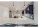 Updated kitchen featuring a breakfast bar with views into the dining area at 26242 S Thistle Ln, Sun Lakes, AZ 85248