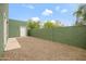 Backyard with gravel, a patio, and green walls at 2715 E Windsor Ave, Phoenix, AZ 85008