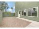 Backyard with gravel, a patio, and green walls at 2715 E Windsor Ave, Phoenix, AZ 85008