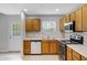 Well lit kitchen features stainless steel appliances and spacious countertop at 2715 E Windsor Ave, Phoenix, AZ 85008