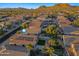 Stunning aerial view of a residential neighborhood featuring well-maintained homes with desert landscaping and mountain views at 33505 N 25Th Ave, Phoenix, AZ 85085