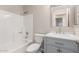 Updated bathroom featuring shower/tub combo, toilet and vanity with framed mirror at 3613 W Camino Real --, Glendale, AZ 85310