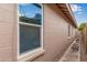 Exterior shot of a home with visible window detail, showcasing its architectural elements and construction at 3613 W Camino Real --, Glendale, AZ 85310