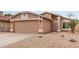 Inviting home with a two-car garage and desert landscaping, offering curb appeal and easy maintenance at 3613 W Camino Real --, Glendale, AZ 85310