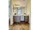 Bathroom with large mirror, cabinets, tiled floors, stylish vanity with plants for a refreshing touch at 3825 E Camelback Rd # 292, Phoenix, AZ 85018
