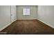 Cozy bedroom featuring carpet flooring and a window with blinds at 3825 E Camelback Rd # 292, Phoenix, AZ 85018