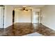 Spacious living area featuring tile floors and a mirrored closet at 3825 E Camelback Rd # 292, Phoenix, AZ 85018
