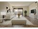 Bright living room with modern furnishings and sliding glass doors leading to the outside at 3825 E Camelback Rd # 292, Phoenix, AZ 85018