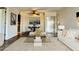 Open-concept living room and dining area with stylish decor and plenty of natural light at 3825 E Camelback Rd # 292, Phoenix, AZ 85018