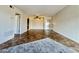 Open living area boasting tile floors, ceiling fan, and an entrance to another room at 3825 E Camelback Rd # 292, Phoenix, AZ 85018