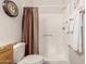 Clean bathroom featuring a walk-in shower with curtain and a neutral color scheme at 3830 E Lakewood Pkwy # 2116, Phoenix, AZ 85048
