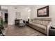 Comfortable living room offers cozy seating, stylish decor, and a welcoming atmosphere at 3830 E Lakewood Pkwy # 2116, Phoenix, AZ 85048
