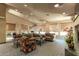 Bright living room with recessed lighting, comfortable seating, and multiple windows at 3830 E Lakewood Pkwy # 2116, Phoenix, AZ 85048