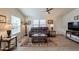 Relaxing living room with stylish furnishings, ample lighting, and views from large windows at 40569 N Wedge Dr, San Tan Valley, AZ 85140